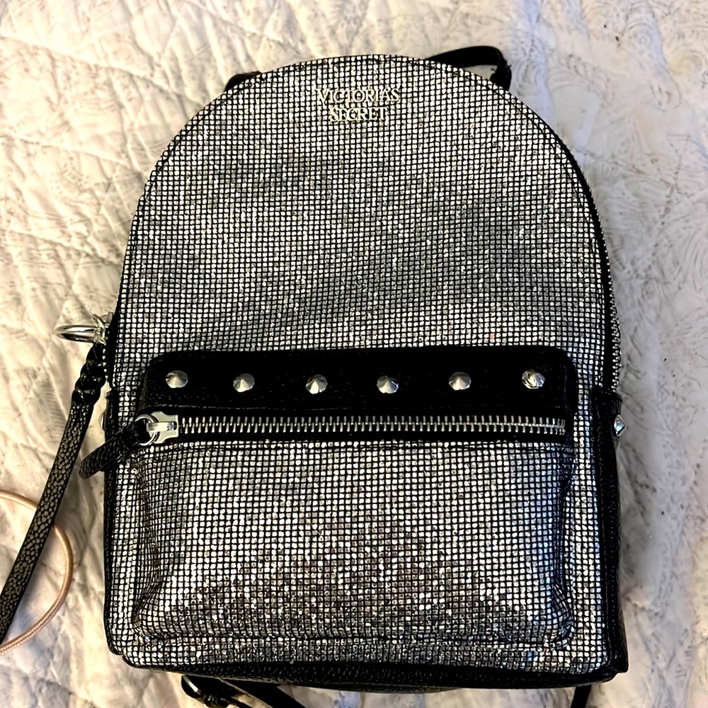 Victorias Secret bling mini backpack. Black/ silver, New, 9 1/2 “ length, 7 1/2”